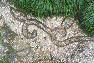 Full Frame Shot Of Pebble pavement.