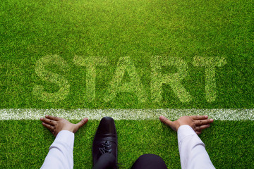 Start background, Top view of Businessman on Start line in soccer grass field, Business Challenge...