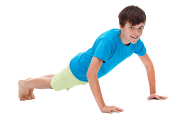 Young boy doing push ups