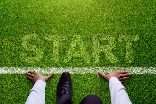 Start background, Top view of Businessman on Start line in soccer grass field, Business Challenge or do something new