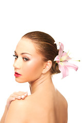 Fototapeta premium Beautiful spa woman with lily.