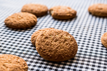 Anzac Biscuits on tablecloth.