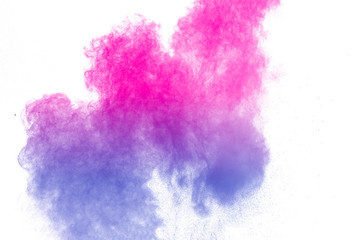 abstract pink-purple powder splatted on white background,Freeze motion of pink-purple powder...