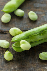 Fresh broad bean pods - closeup with selective focus