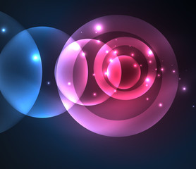 Glowing shiny overlapping circles composition on dark background