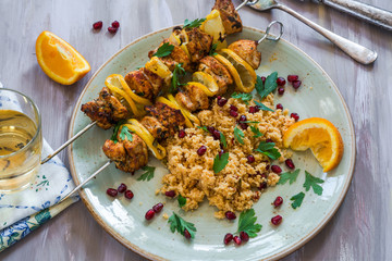 Spiced chicken and lemon skewers with couscous