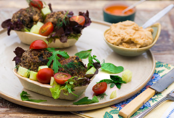 Mediterranean beef meatballs with salad in taco shells