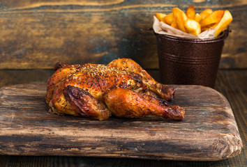 Roasted spatchcock poussin with potato chips