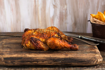 Roasted spatchcock poussin with potato chips