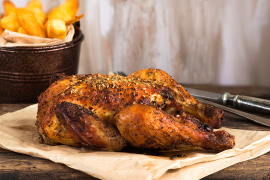 Roasted spatchcock poussin with potato chips