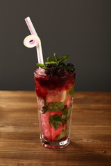 alcoholic blackberry cocktail with mint