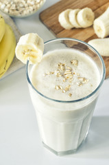 Milkshake with banana and oatmeal , healthy breakfast