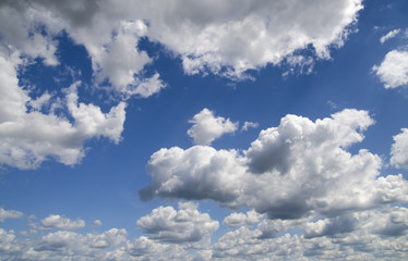 Heavy clouds in the deep blue summer sky