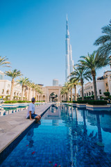 Boy resting near the water in Dubai