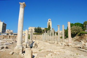 Fototapeta premium Remains of ancient columns at Al Mina excavation site in Tyre, Lebanon