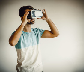 Fototapeta premium Man wearing virtual reality goggles.