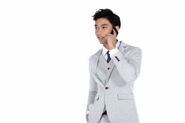 Gray Dot Suit Pant Businessman, Tan skin man half body talk to someone in mobile smart phone feeling expression, studio lighting white background isolated copy space