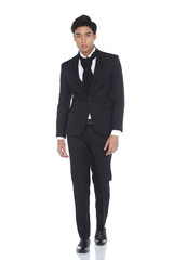 Asian Look Tan Skin Business Man in Black Suit Pant Shoe necktie, studio lighting white background isolated, walk action fashion pose