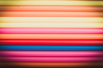 Abstract background from many multi-color straws.