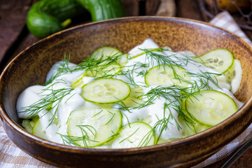 fresh cucumber salad with yogurt and young potatoes