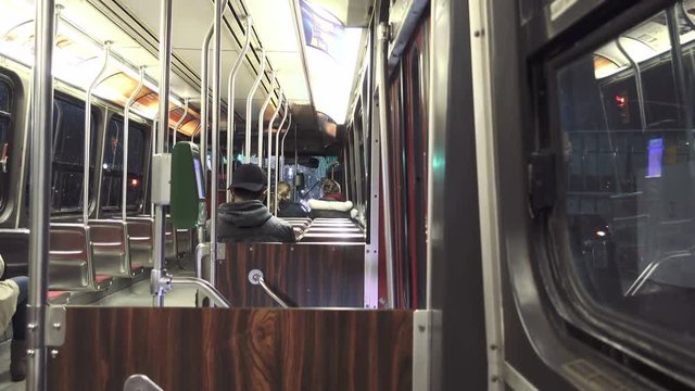 POV shot of a streetcar ride in a modern city.