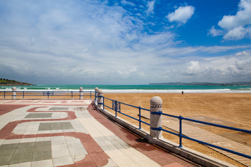 Fototapeta na wymiar Santander waterfront promenade and surfer beach, Spain