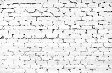 Old white brick wall. Cracked white brick wall texture background. Loft styled concrete with grunge block. Chic, clean and vintage. Close up.