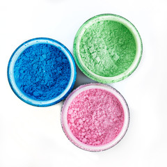 Multicolored professional powder eye-shadows on white background