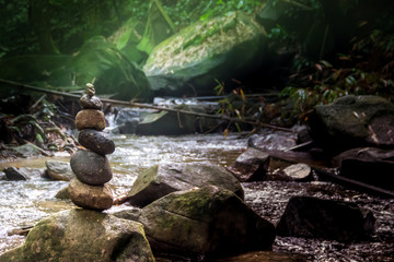 stone pyramid forest river balance rocks
