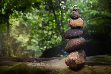 stone pyramid forest river balance rocks