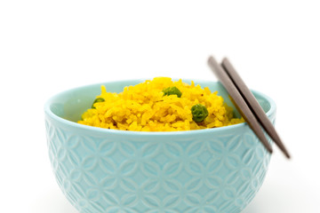 Homemade Chinese fried rice with vegetables and fried eggs