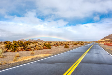 Open highway and rainbow