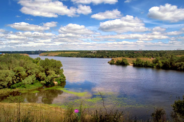 Fototapeta na wymiar Beautiful summer landscape with river and blue sky