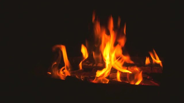 Fire flame close isoltaed on black background, 4k