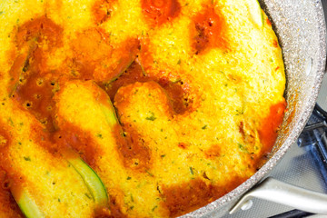 Cook stuffed zucchini