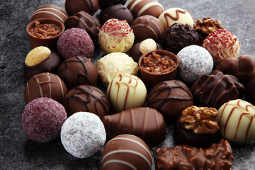 a lot of variety chocolate pralines, belgian confectionery gourmet chocolate