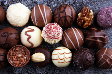 a lot of variety chocolate pralines, belgian confectionery gourmet chocolate