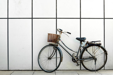Naklejka na ściany i meble City Bike with White Tiles Background