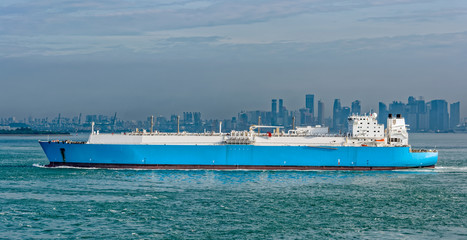 Fototapeta premium LNG tanker is passing by Singapore Strait.