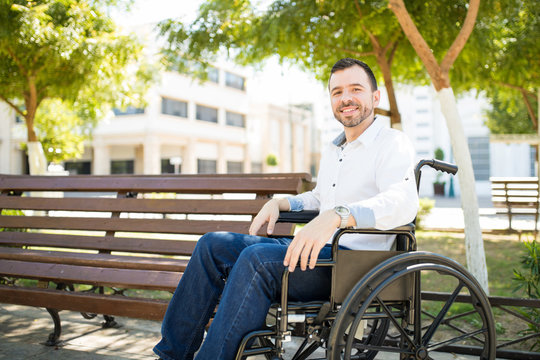 Optimistic man in a wheelchair