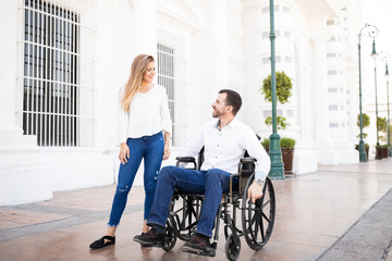 Woman dating man in a wheelchair
