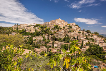 Famous old village Gordes in Provence against sunset in France