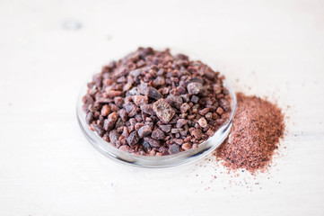 healthy himalayan pink salt rocks and powder in glass plate
