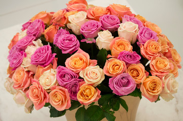 Large bouquet of pink, white, cream roses