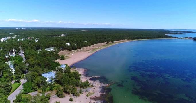 Hanko beach, Cinema 4k aerial view towards bellevue beach, on hango regatta day, in the finnish archipelago city Hanko, Finland