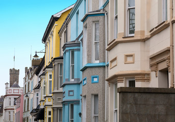 Fototapeta na wymiar Panorama of colorful townhouses in Caernarfon, Wales.
