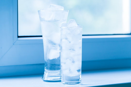 Drink. Water glass and ice