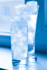 Drink. Water glass and ice