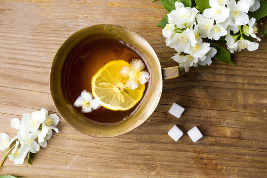 Jasmine tea with lemon in a cup