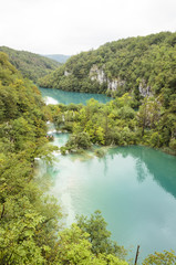 Fototapeta na wymiar landscape of two ake and mountains at Plitvice lakes park